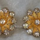 Signed BSK Gold tone textured flower earrings clear rhinestone vintage bling