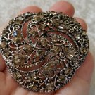 Silver tone pin brooch vintage rhinestones charcoal filigree swirl crystal