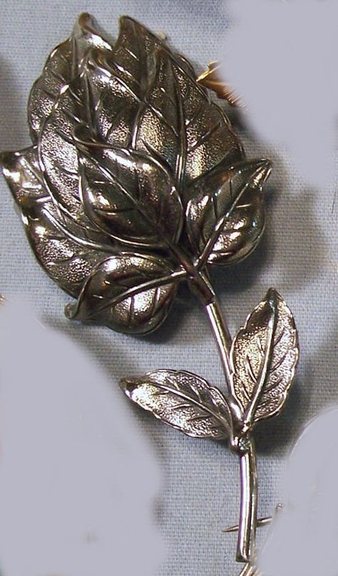 Silver tone leafy flower bud pin signed Botticelli vintage pin brooch 1969-78