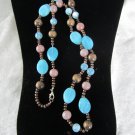 Necklace wood beads. Lucite plastic ocean blue and tan beads iridescent opaque
