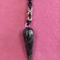 Handmade black and rose gold pendulum