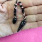 Handmade black and rose gold pendulum