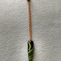 Handmade green and black polymer clay pendulum