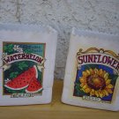 B. MOCK DECORATIVE CERAMIC BOX, EACH WITH BRIGHTLY COLORED DECALS