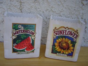 B. MOCK DECORATIVE CERAMIC BOX, EACH WITH BRIGHTLY COLORED DECALS