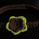 Brown and green headband