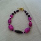 Pink and black Jesse james beaded bracelet