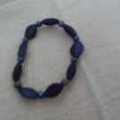 Blue glass beads with elastic band.