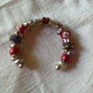 red and silver beaded cuff bracelet