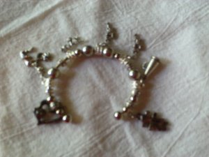 Silver charm cuff bracelet