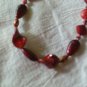 Jesse James red with black and gold glass beaded necklace