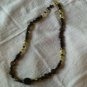 Handcrafted black and gold acrylic and glass beaded necklace