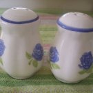 salt and pepper shakers white with blue Roses and green leaf 3 " tall salt and pepper shakers white with blue Roses and green leaf 3 " tall