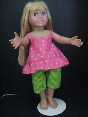 Green dot shirt and striped capris for American girl