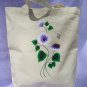 Tote Bag with White and Lavender Flowers and Butterfly Charm.