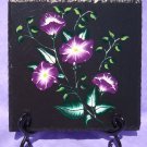 Black Trivet With Painted Flowers