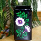 Black Vase with Purple and White Flowers