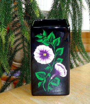 Black Vase with Purple and White Flowers