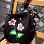 Black Messenger Bag with Burgundy and White Flowers and Butterfly Charm