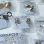 50 Package Lot of All Different Brand New Sets of Earrings ( way over 20 pairs )