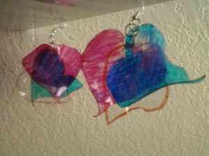 Heart shaped trio plastic earrings