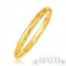 14k Yellow Gold Domed Bangle with a Weave Motif 14k Yellow Gold Domed Bangle with a Weave Motif