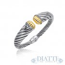 18K Yellow Gold and Sterling Silver Diamond Decorated Cuff Bangle (.12 ct. tw.) 18K Yellow Gold and Sterling Silver Diamond Decorated Cuff Bangle (.12 ct. tw.)