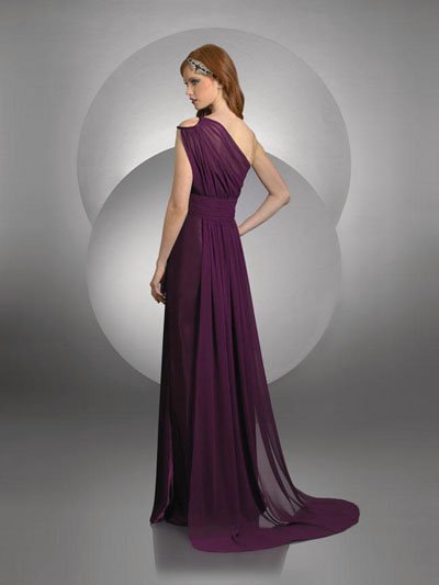 Floor length one shoulder dress with peek-a-boo opening on shoulder strap.