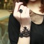 A PAIR GOTH BLACK LACE ROCOCO SLAVE BRACELET WITH BLACK ROSE GLOVES