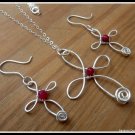Handmade Cross Pendant with Ruby wire wrapped in Sterling Silver with chain, July birthstone