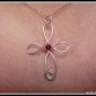 Handmade Cross Pendant with Ruby wire wrapped in Sterling Silver with chain, July birthstone