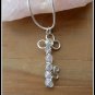 Handmade Rose Quartz Key Pendant, wire wrapped in Sterling Silver