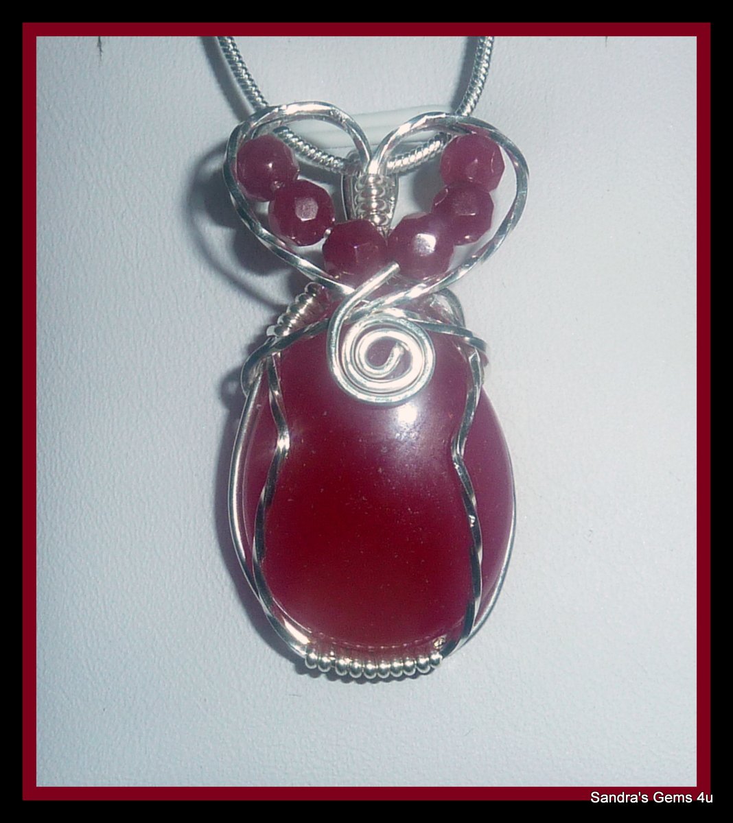 Handmade Ruby Pendant, wire wrapped in Sterling Silver, July birthstone