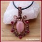 Morganite Ornate Pendant with Rubies wire wrapped in Antique Copper, with Black Leather Necklace
