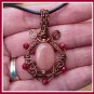 Morganite Ornate Pendant with Rubies wire wrapped in Antique Copper, with Black Leather Necklace