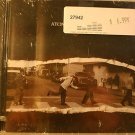 Brand New in wrapper CD Atomic Tangerine