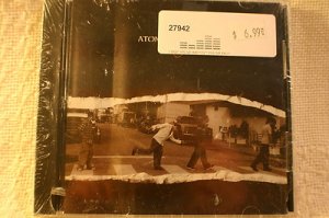 Brand New in wrapper CD Atomic Tangerine