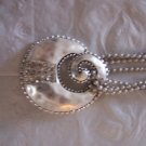 Dimond swirl statement necklace