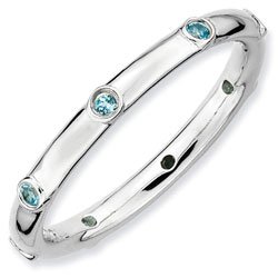 Silver stackable ring with blue topaz eternity band