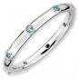 Silver stackable ring with blue topaz eternity band