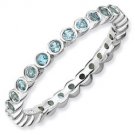 Silver stackable ring with blue topaz eternity band