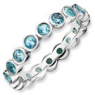 Silver stackable ring with blue topaz eternity band