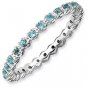 Silver stackable ring with blue topaz eternity band