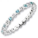 Silver stackable ring with blue topaz eternity band