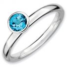 Silver stackable ring with blue topaz