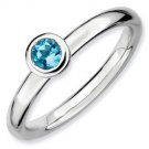 Silver stackable ring with blue topaz