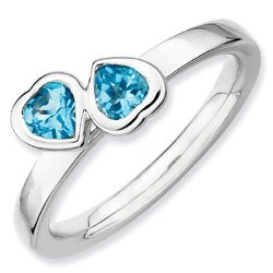 Silver stackable ring with blue topaz hearts