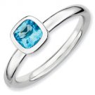 Silver stackable ring with blue topaz square
