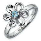 Silver stackable ring with blue topaz flower