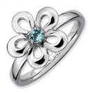Silver stackable ring with blue topaz flower